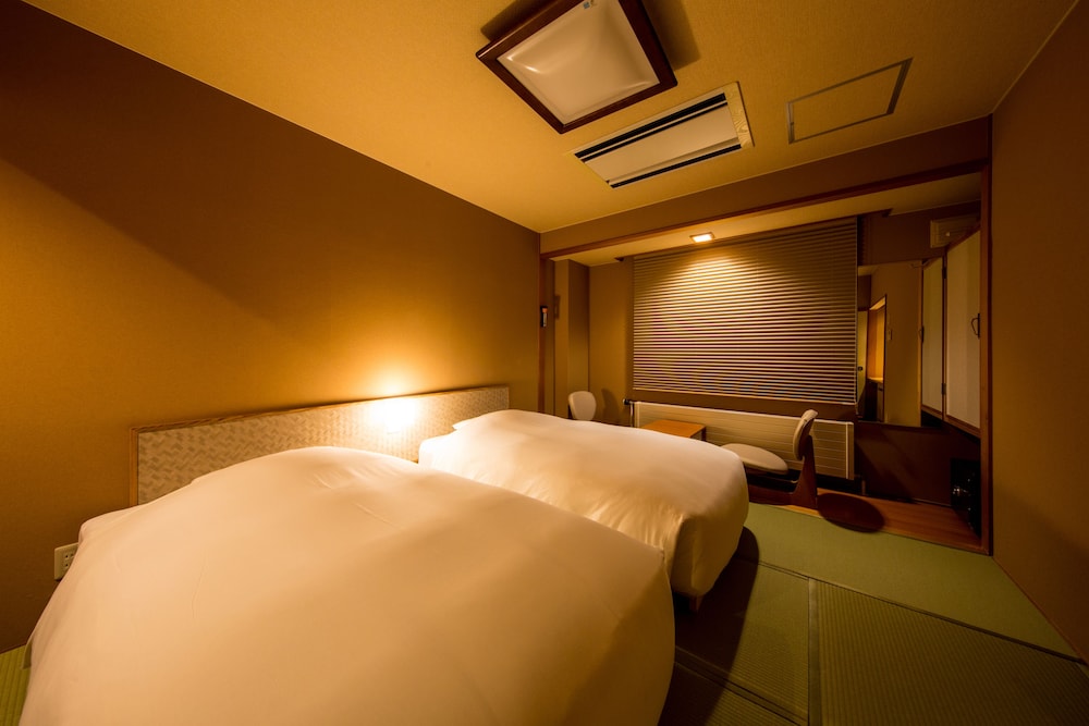 Twin Room - Photo 1