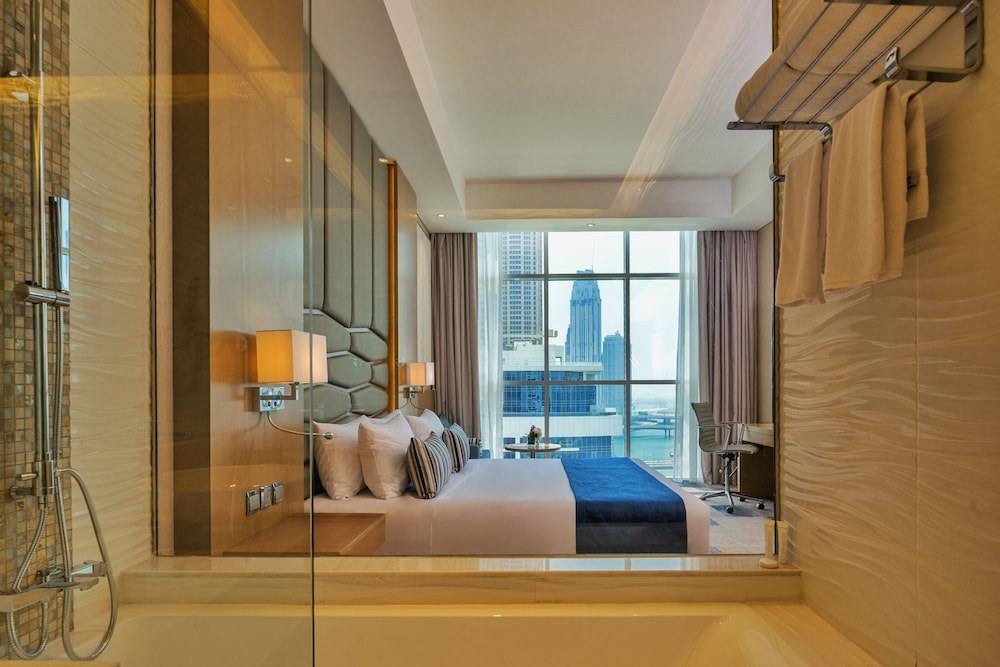 Deluxe Room Partial Dubai Canal view with free access to Hotel's private beach at Palm-Jumeirah photo 1
