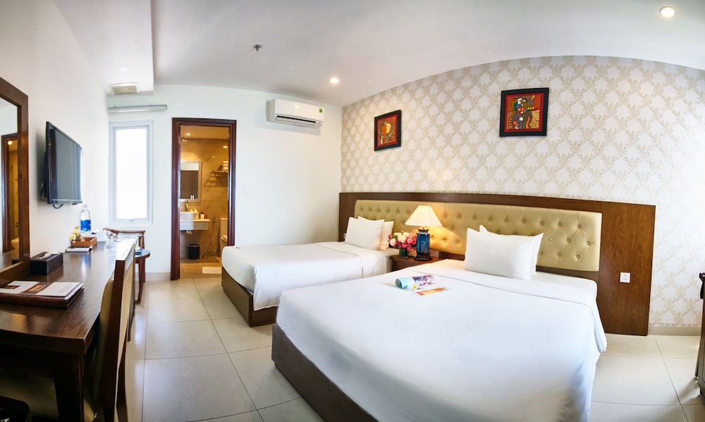 Deluxe Triple Room, Partial Ocean View photo 1
