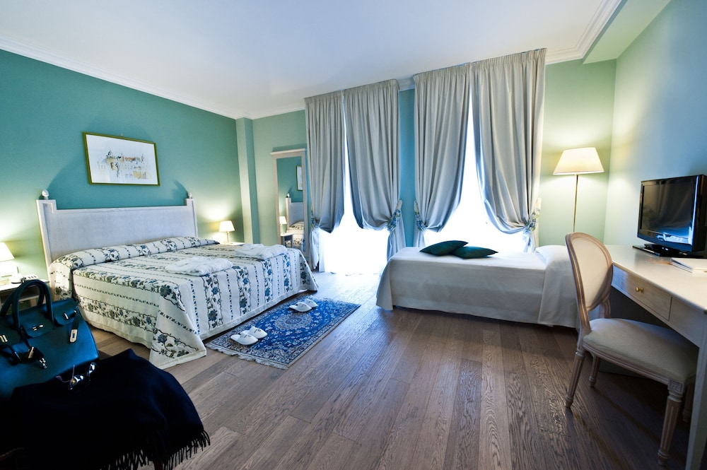 Family Triple Room - Photo 1