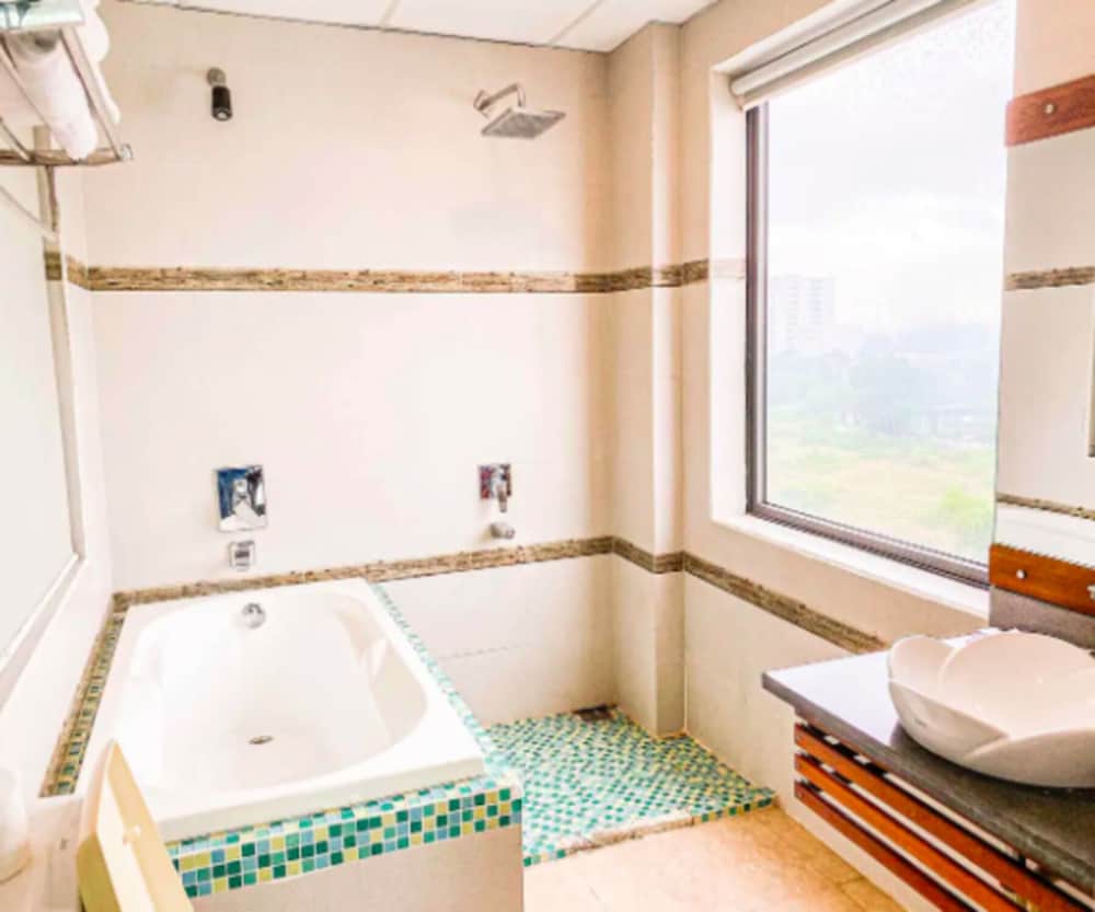 Deluxe Triple Room, Balcony, City View