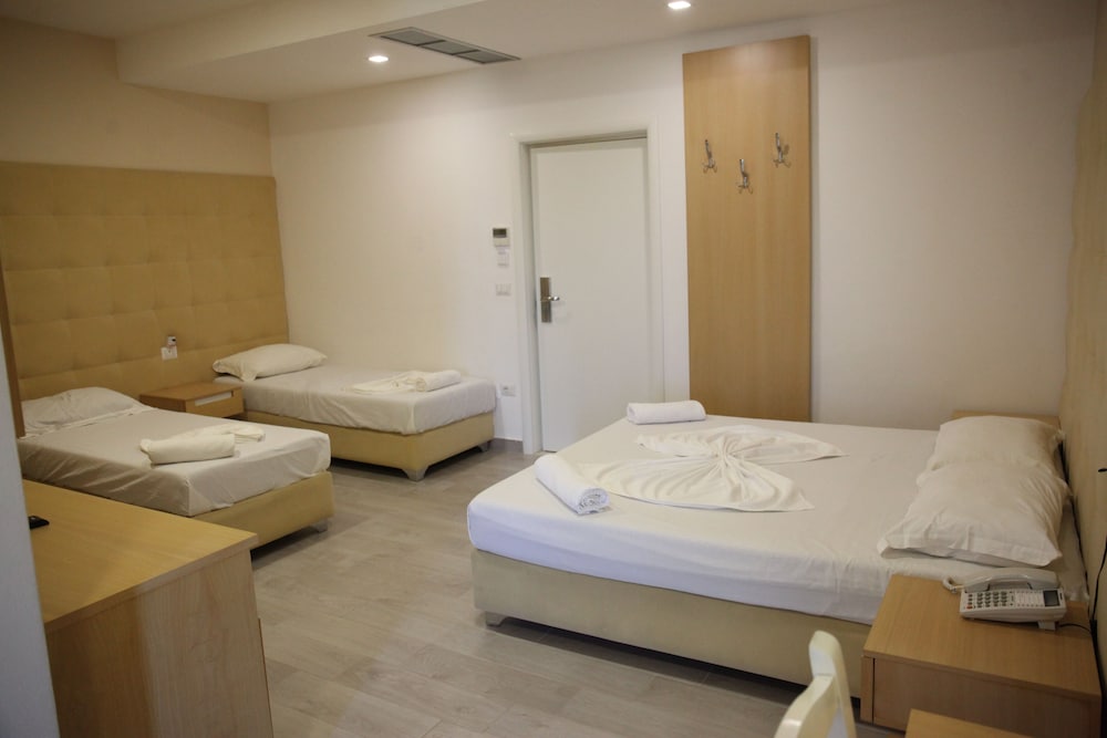 Standard Quadruple Room, 4 Bedrooms, Balcony photo 3