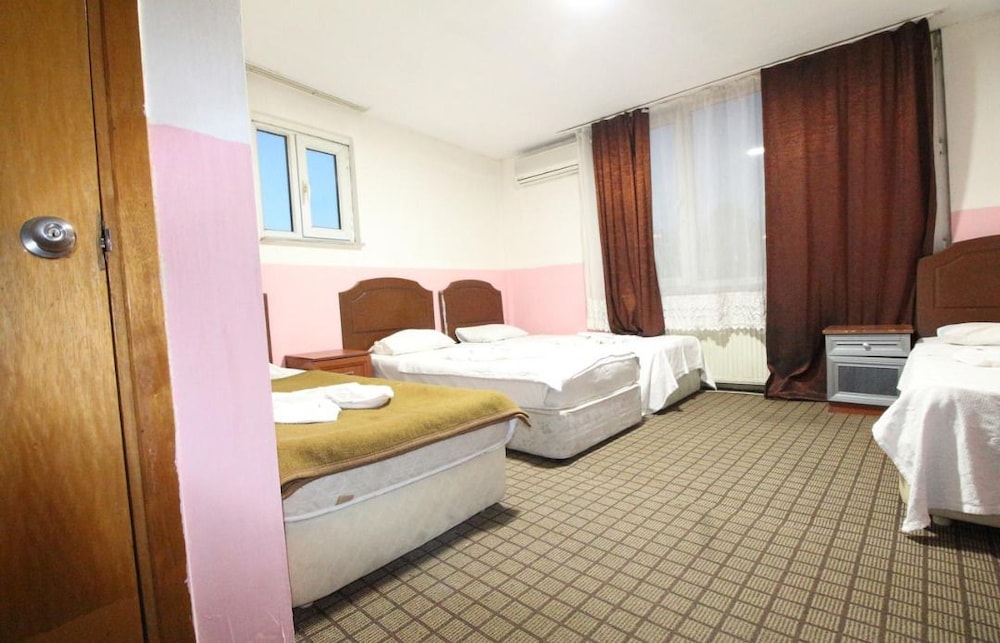 Economy Quadruple Room, City View photo 1