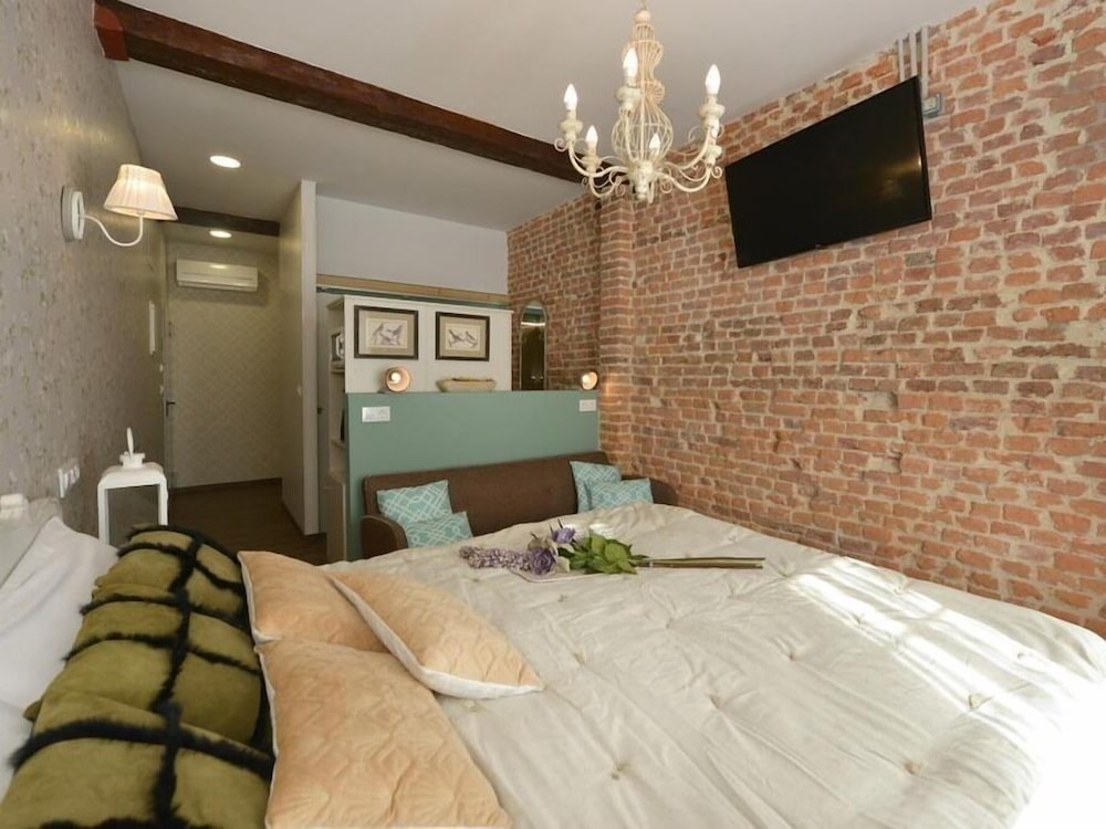 Habitación Triple Deluxe con Baño Privado (Puertochico)