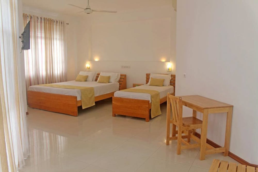 Standard Quadruple Room, City View photo 1