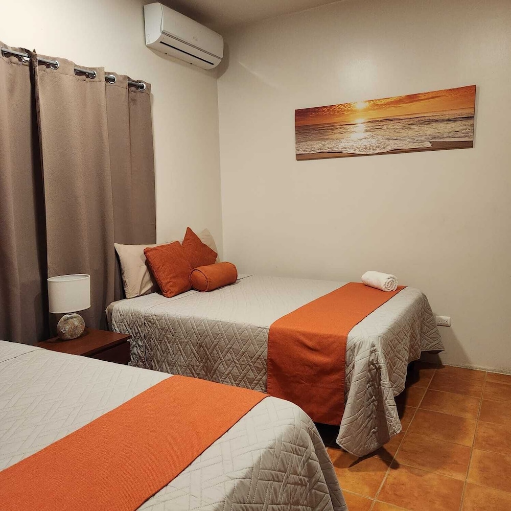 Comfort Quadruple Room, 2 Queen Beds, Patio photo 1
