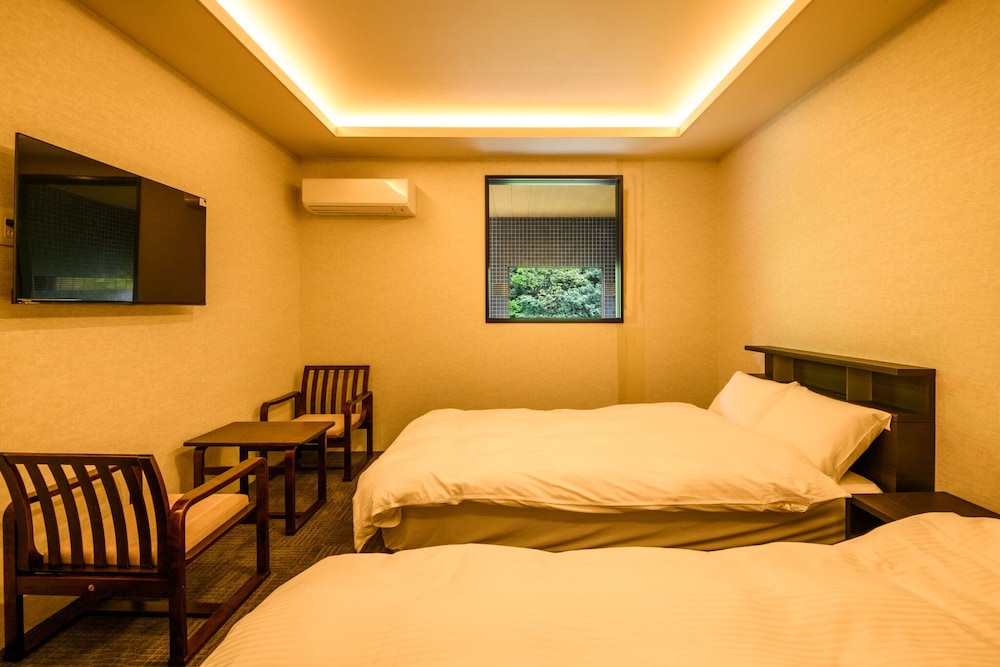 Twin Room with Open-Air Hot Spring, Sauna & Stream View - New in 2025 photo 3