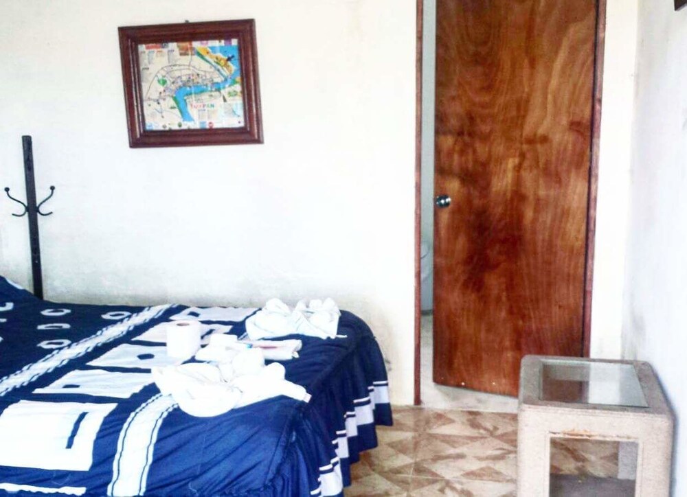 Basic Quadruple Room, 1 Bedroom, Beachside photo 1