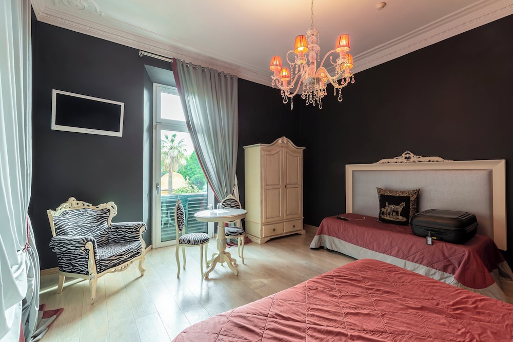 Quadruple Room - Photo 1