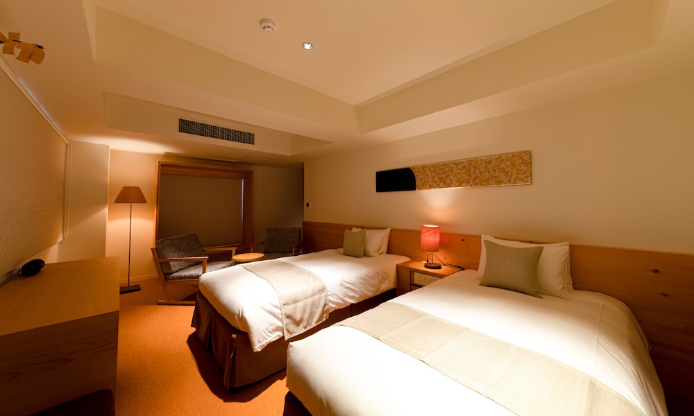Deluxe Twin Room - Photo 11