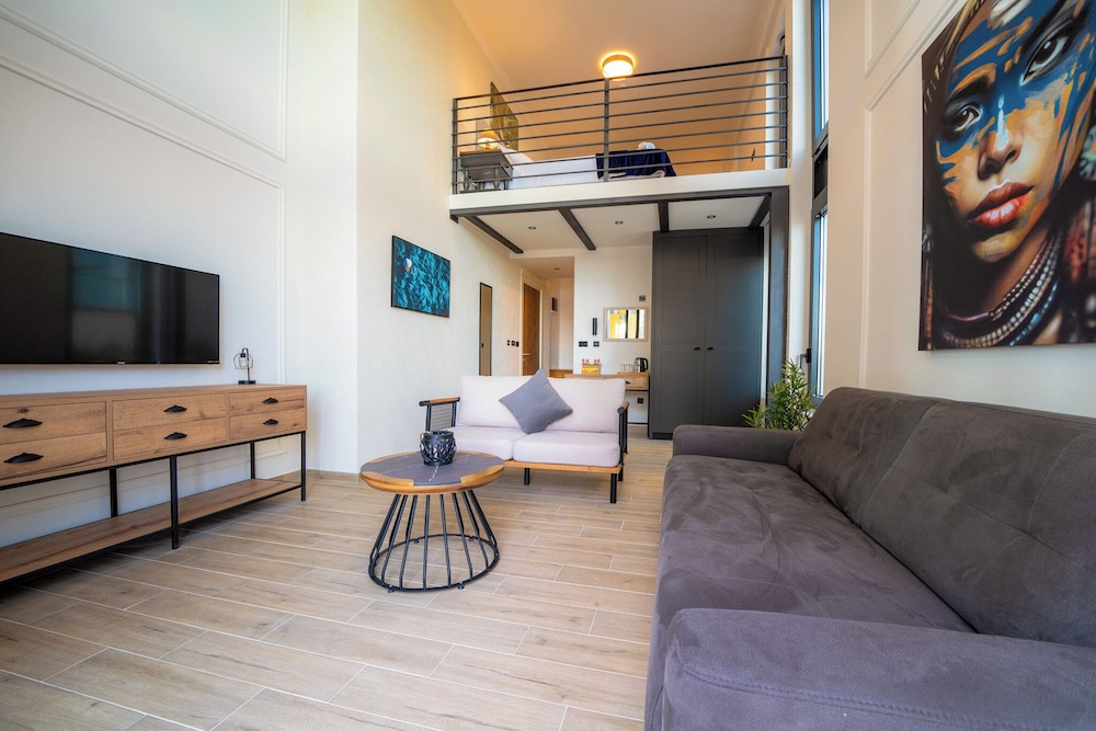 Deluxe Duplex, 1 Queen Bed with Sofa bed, Balcony, Pool View