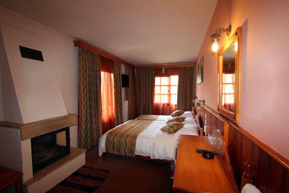 Triple Room (and Fireplace) photo 2