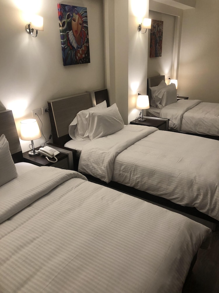Standard Triple Room, City View - Photo 6