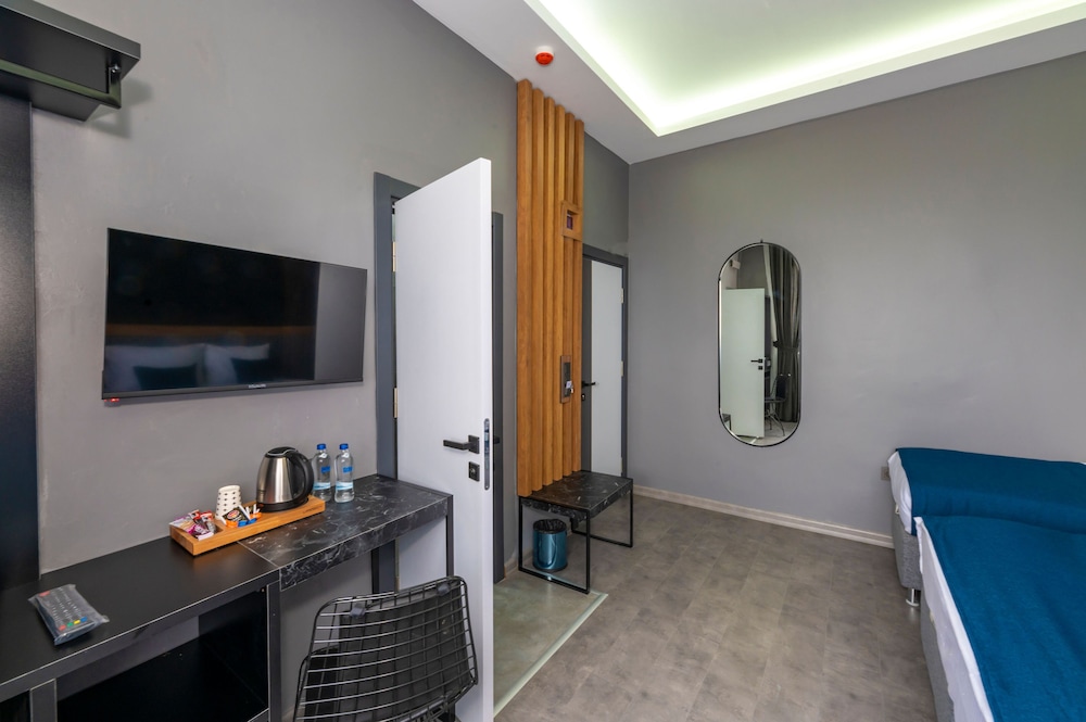 Deluxe Triple Room - Photo 7