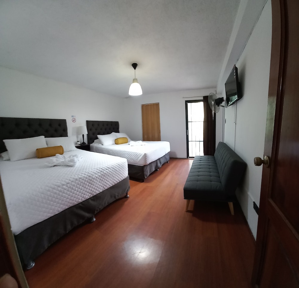 Standard Quadruple Room, Multiple Beds, Non Smoking, Private Bathroom photo 1