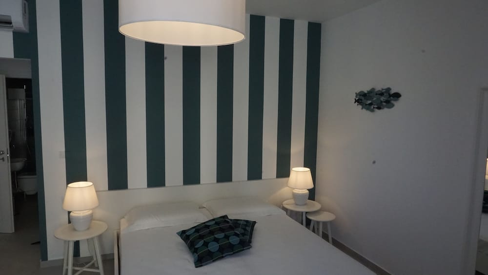 Superior Quadruple Room, Balcony (Ponente)