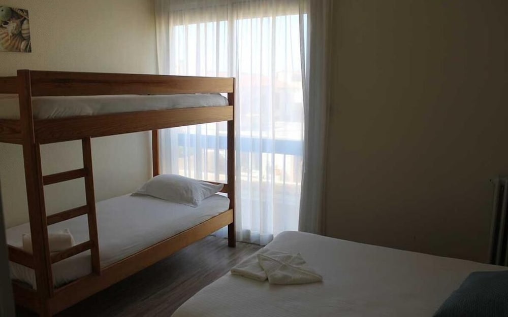 Quadruple Room, Multiple Beds, Partial Sea View