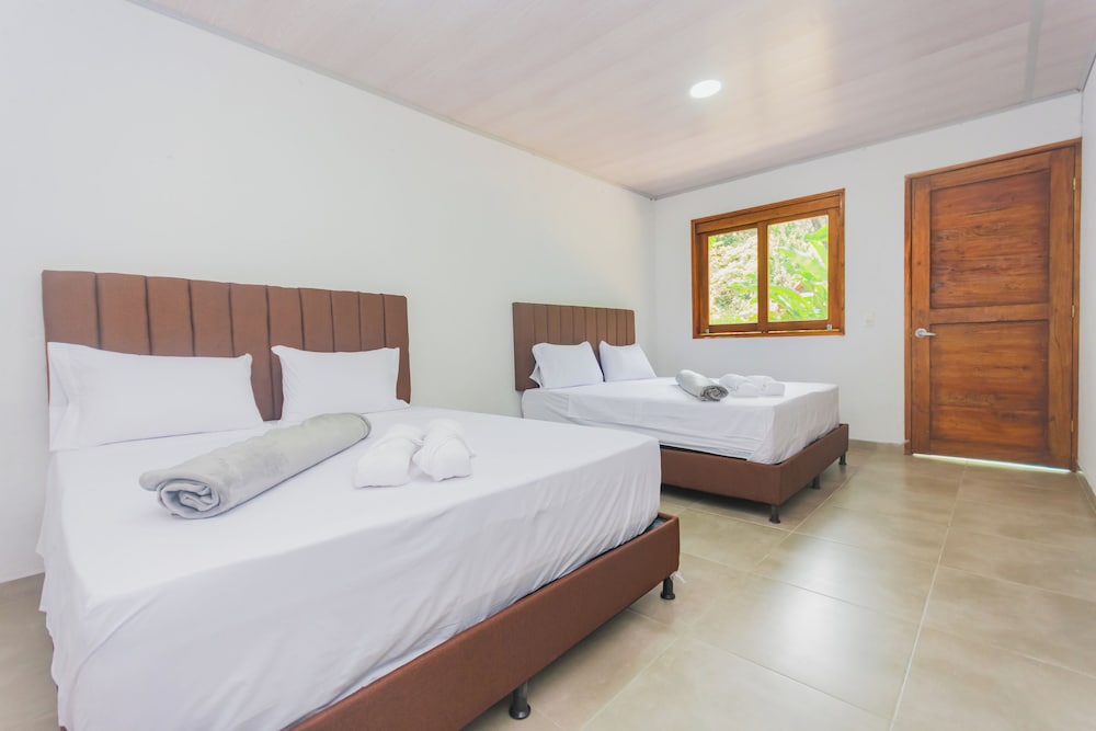 Superior Quadruple Room, 2 Queen Beds, Garden View