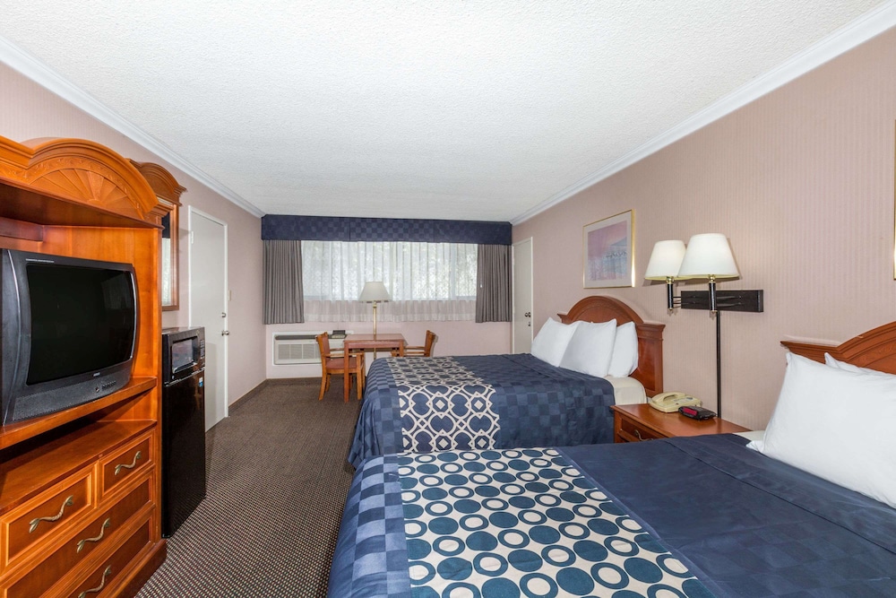 Room, 2 Queen Beds, Refrigerator & Microwave photo 2