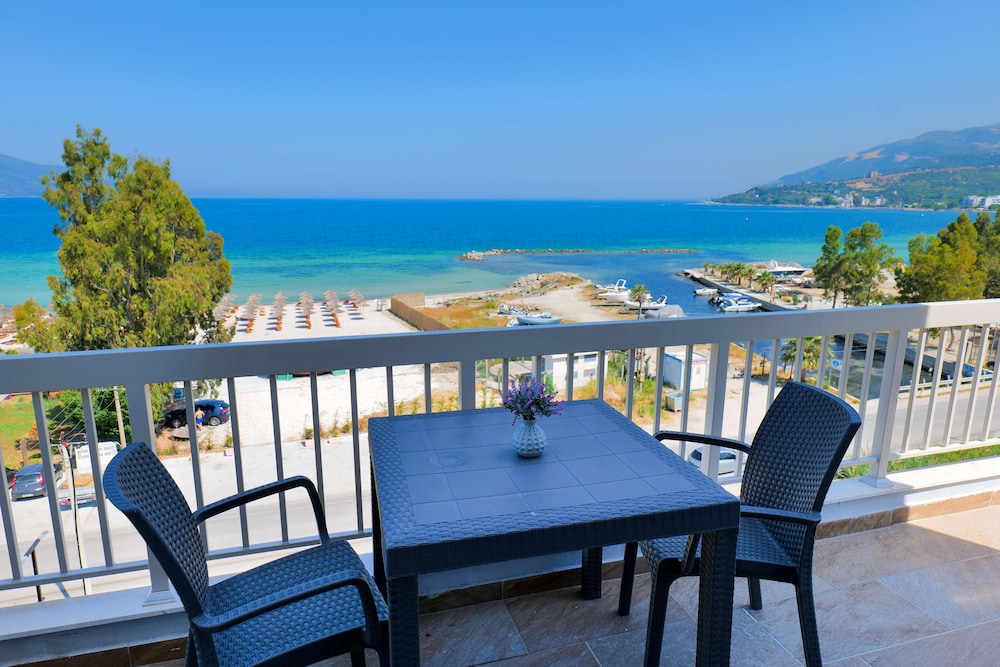 Quadruple Room, Beach View photo 3