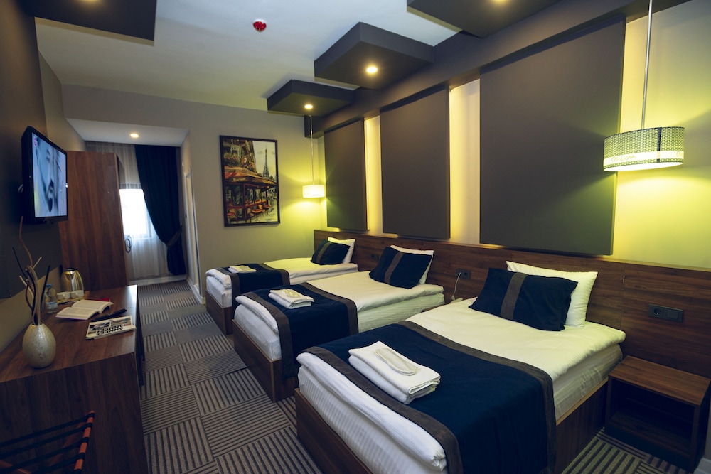 Economy Triple Room - Photo 1