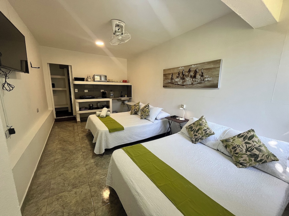 Quadruple Room, private Kitchen, Courtyard View