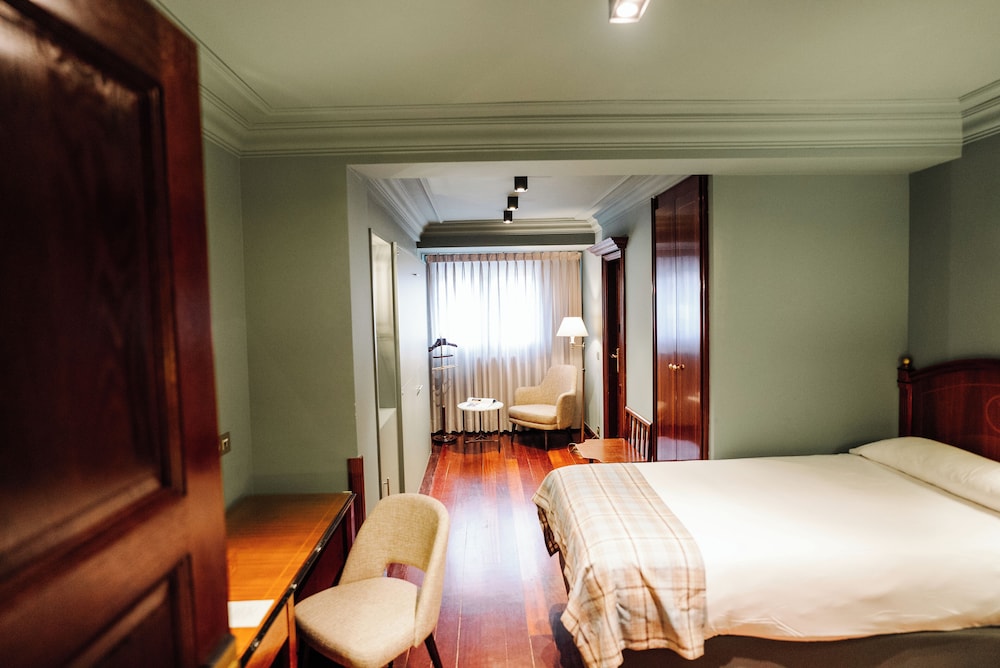 Triple Room - Photo 1