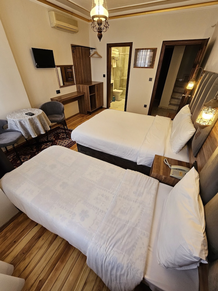 Standard Triple Room, Multiple Beds, Non Smoking, City View photo 1