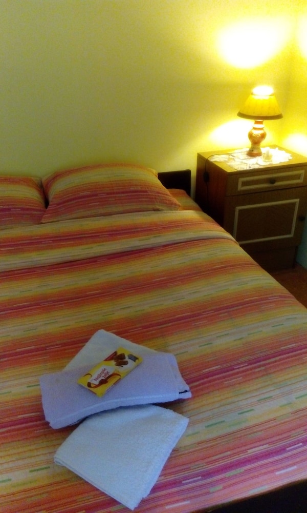 Economy Triple Room, Multiple Beds photo 1