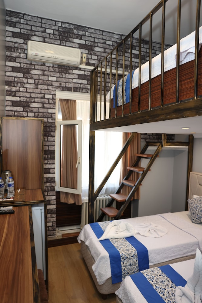 Deluxe Triple Room - Photo 5