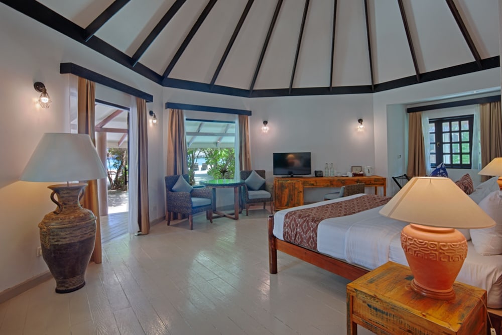 Villa Acesso à Praia com 15% de Desconto em Alimentos e Bebidas (exceto serviço de quarto).
