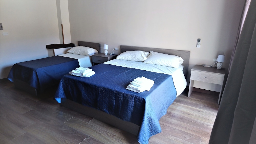 Deluxe Triple Room, Balcony photo 2