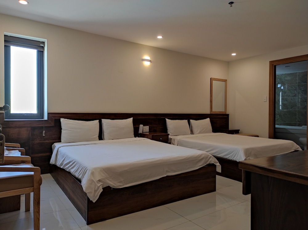 Standard Quadruple Room - Photo 9