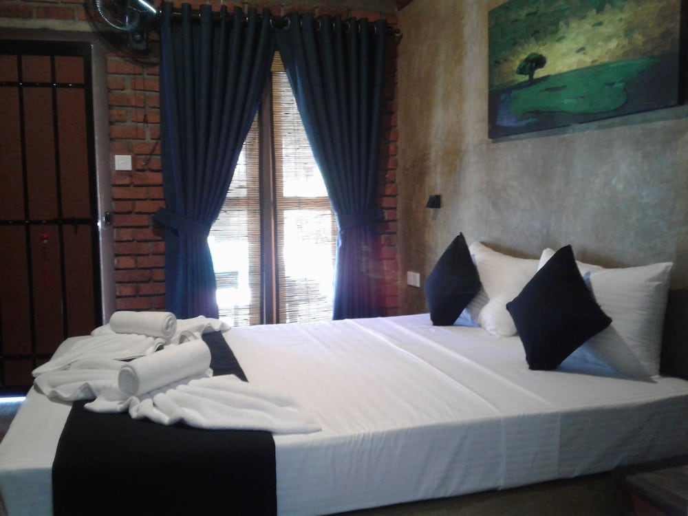 Deluxe Queen Room - Photo 6