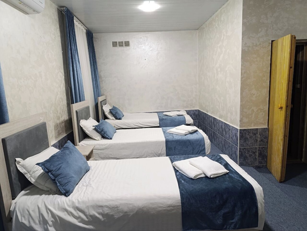 Economy Triple Room, Courtyard View photo 2
