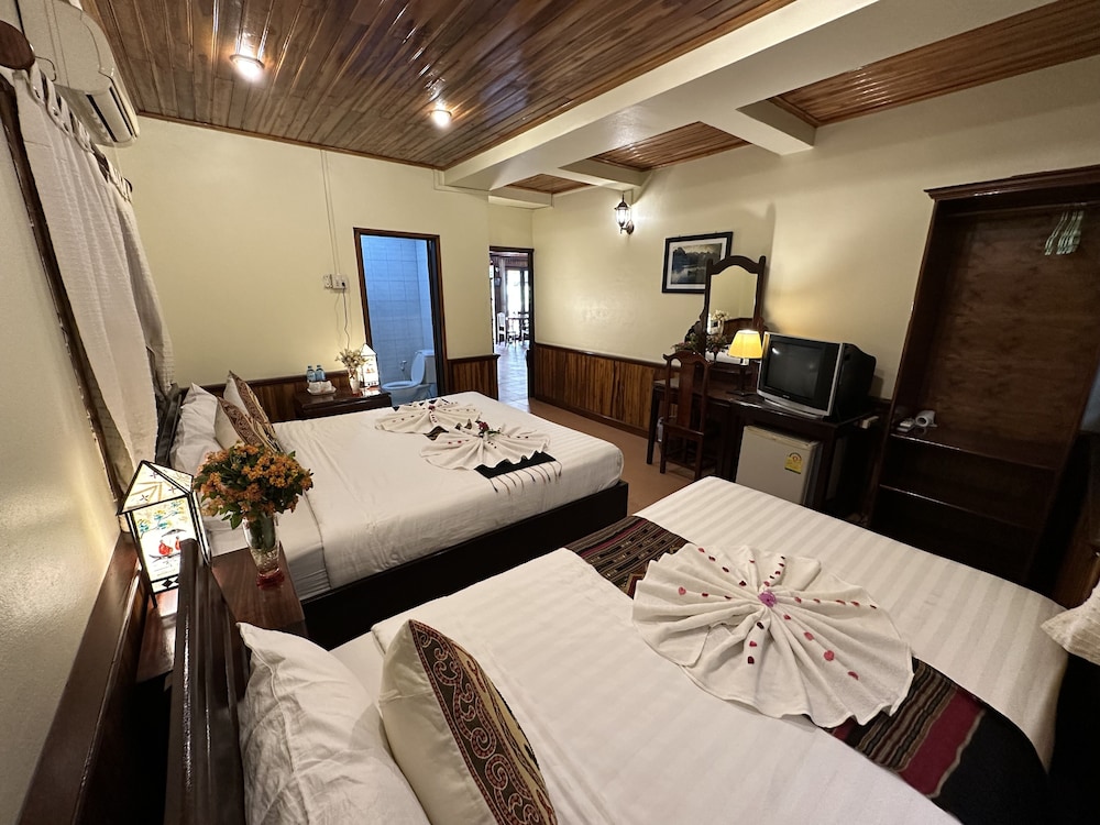 Deluxe Triple Room - Photo 19
