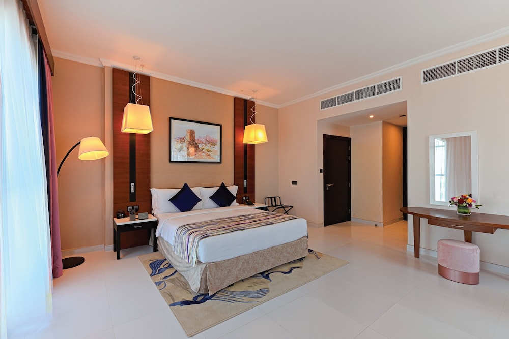 Deluxe King Room - Photo 4