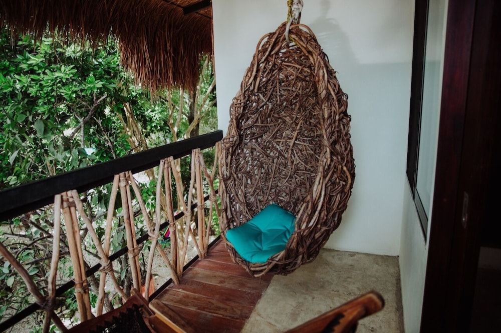 Deluxe Quadruple Room, 1 Bedroom, Balcony, Garden View
