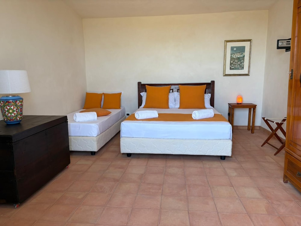 Deluxe Triple Room, Garden View photo 1