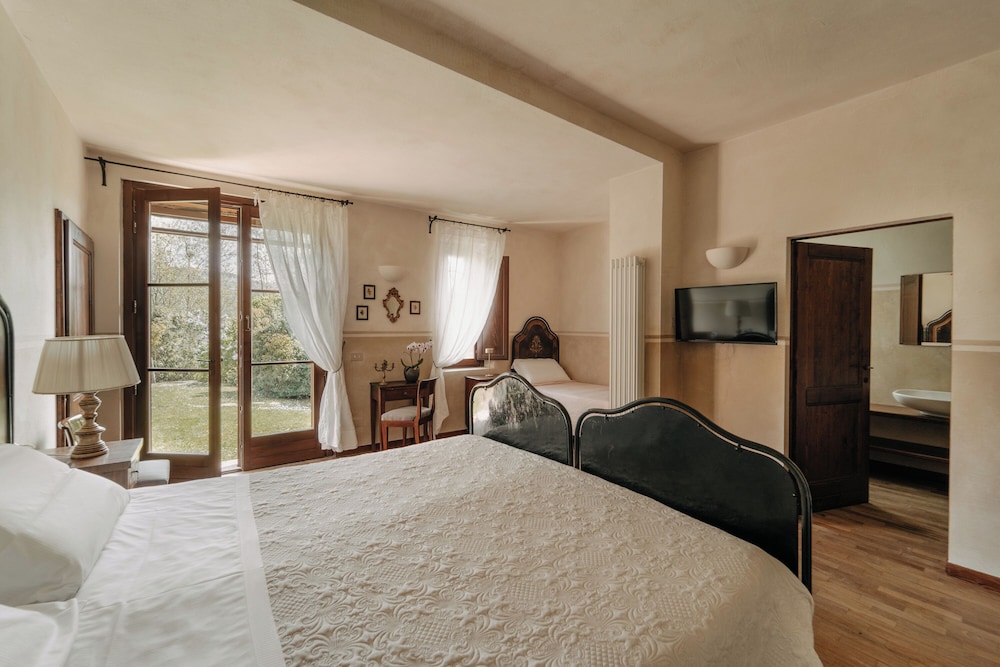 Deluxe Triple Room, Patio, Garden View photo 1
