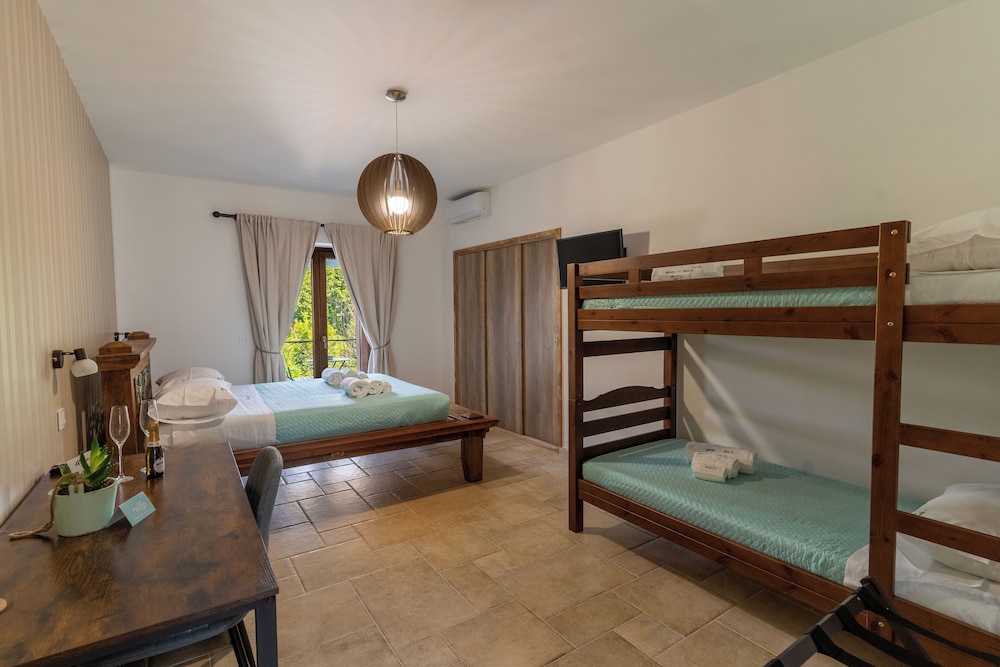 Comfort Quadruple Room, Garden View