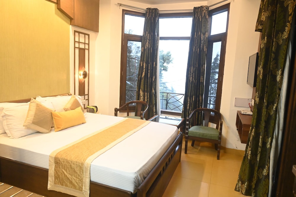 Deluxe Room - Photo 1