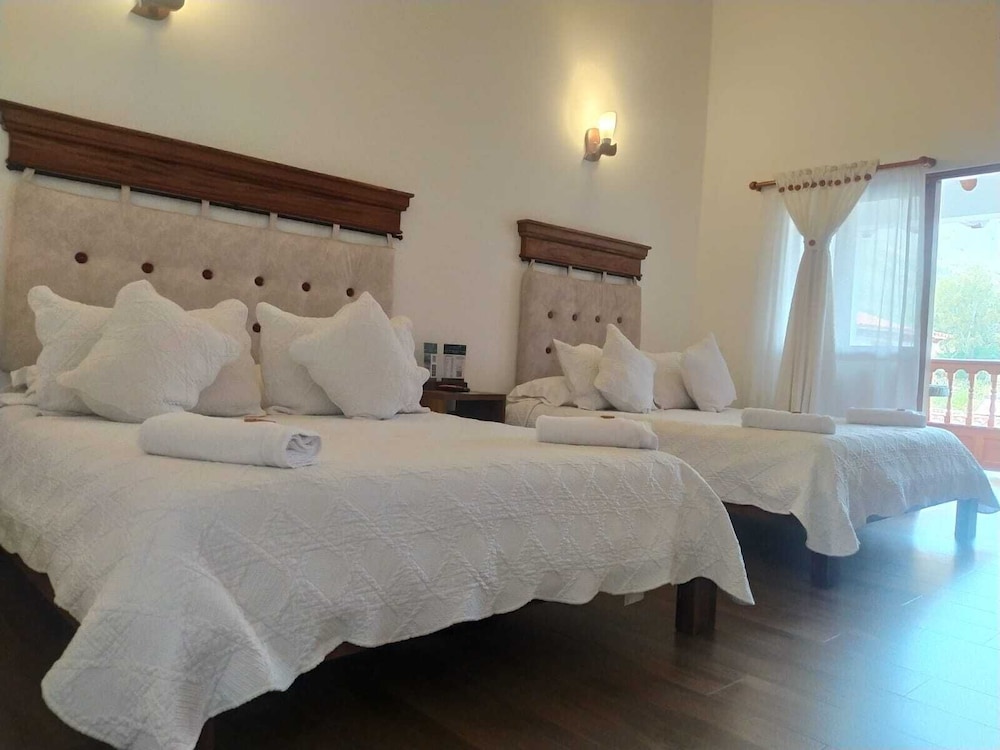 Deluxe Quadruple Room - Photo 2