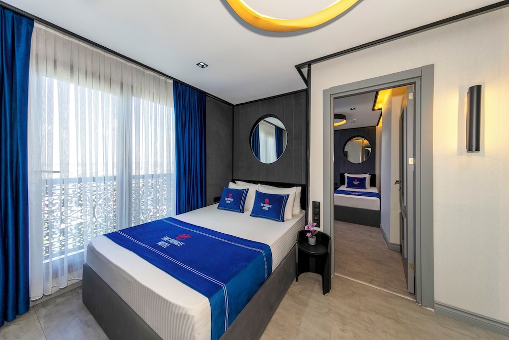Deluxe Quadruple Room - Photo 7
