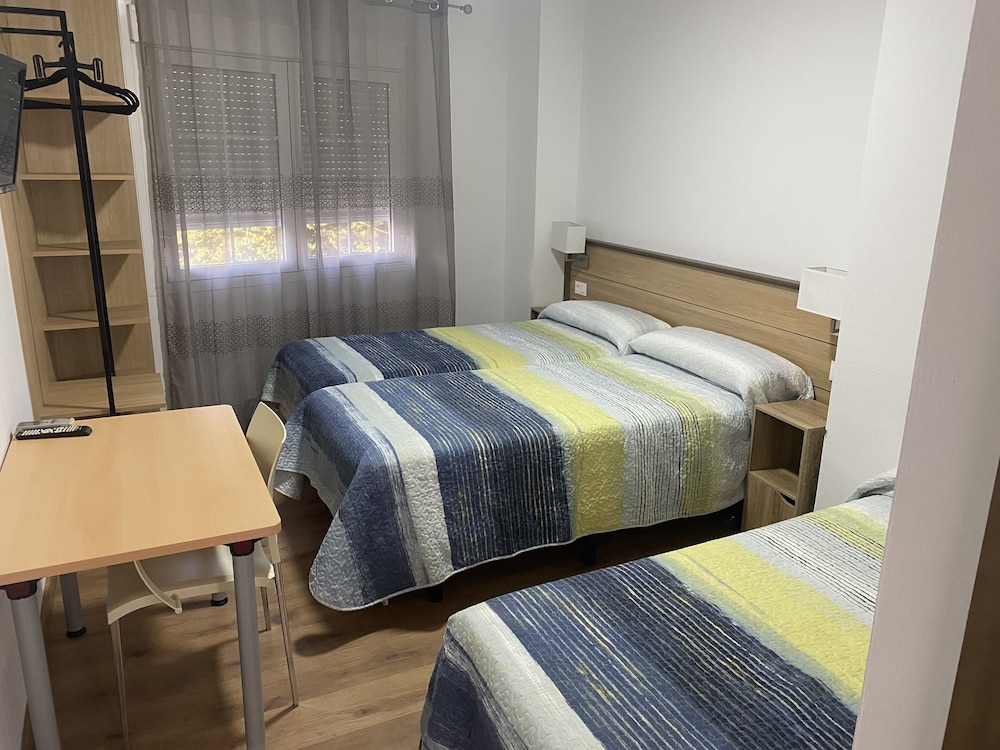 Triple Room - Photo 1