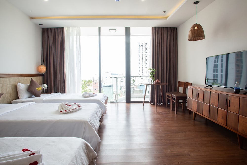 Deluxe Triple Room - Photo 10