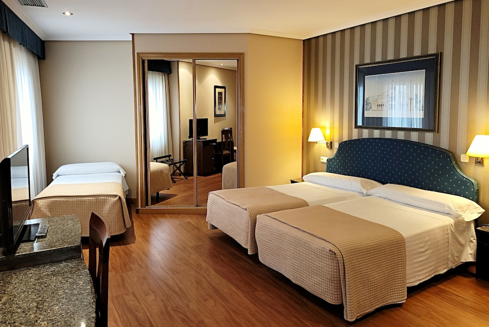 Triple Room - Photo 1