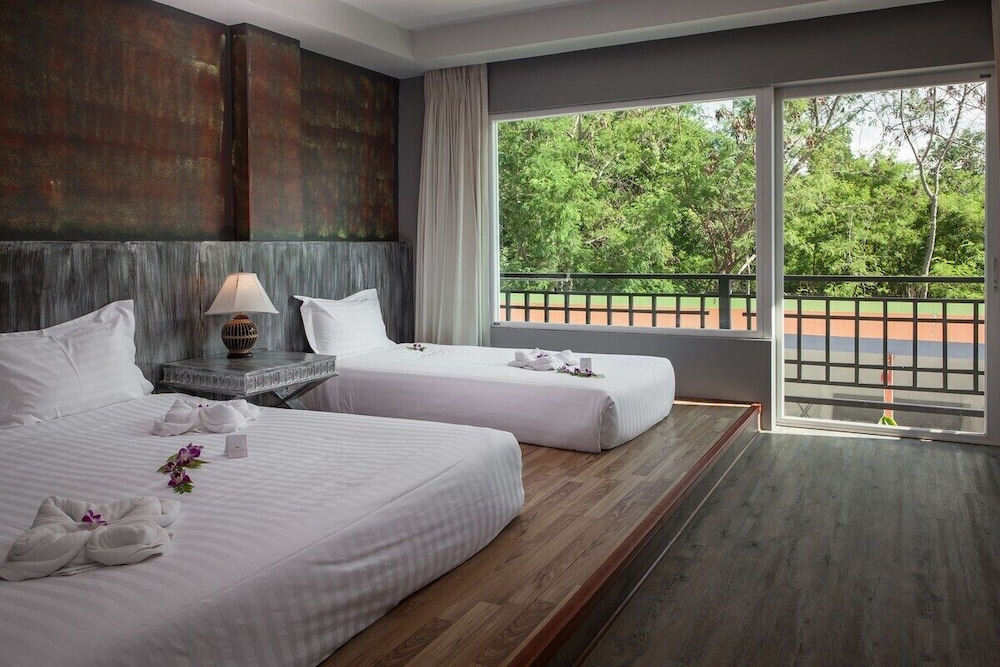 Deluxe Triple Room - Photo 13
