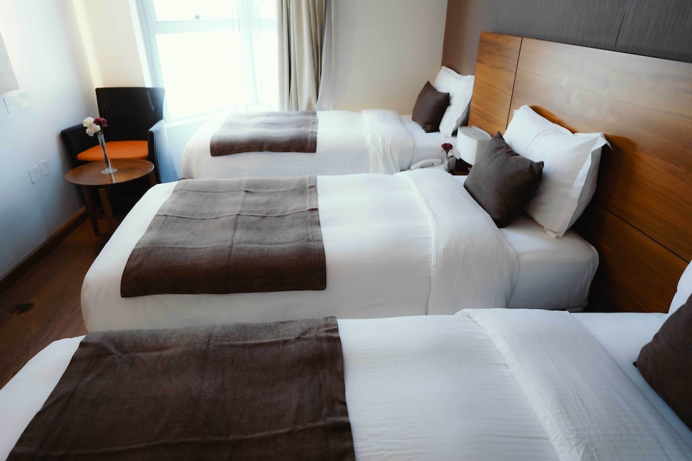 Deluxe Triple Room - Photo 10