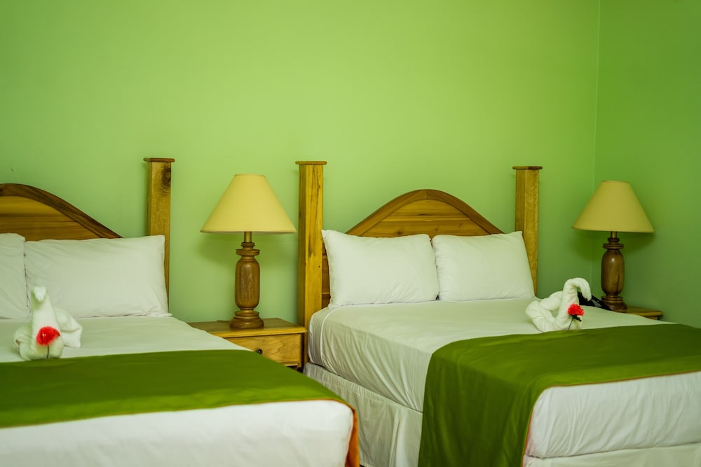 Deluxe Quadruple Room, 2 Queen Beds, Garden View